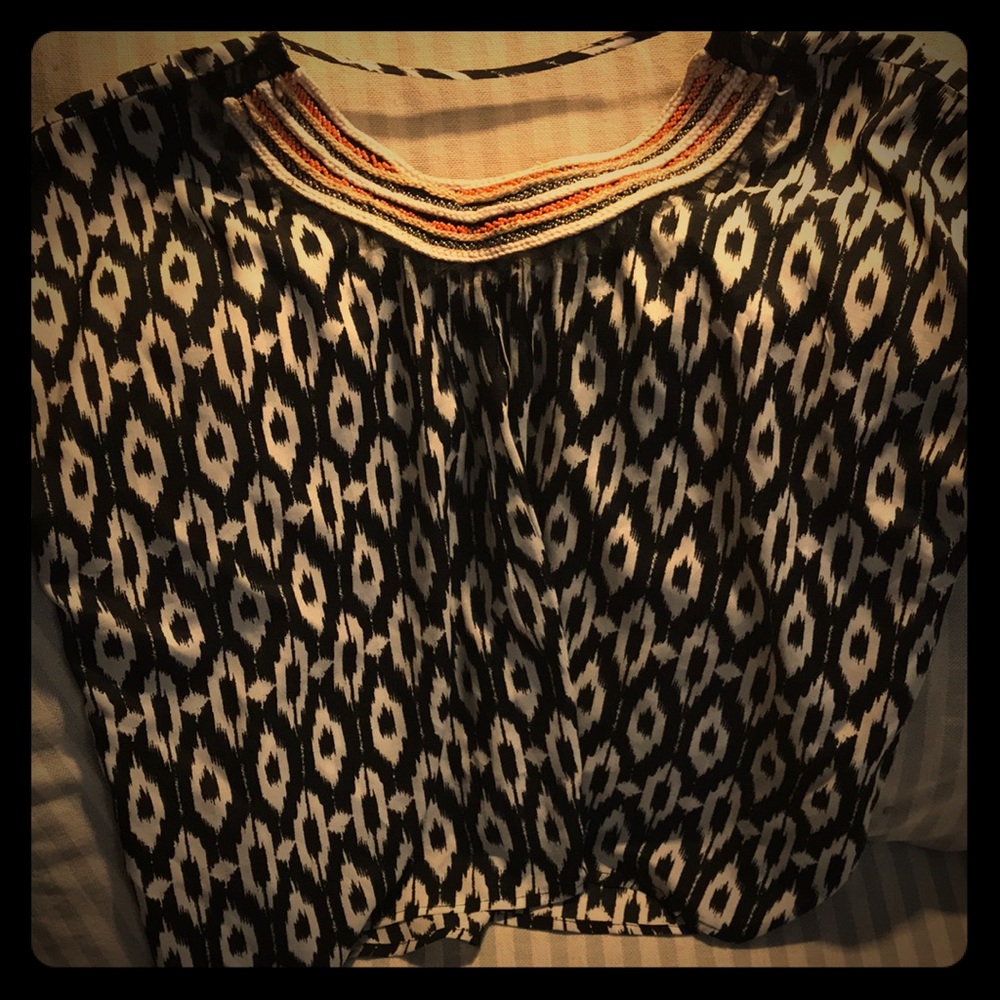 Unique details on a flowing blouse